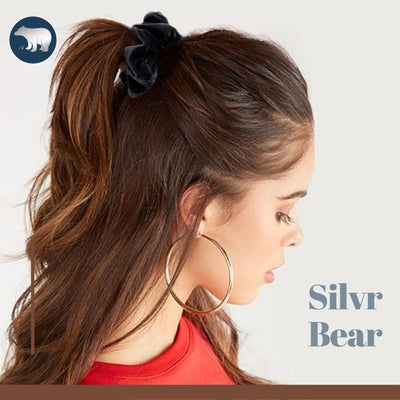 Look trendy & sporty using a black velvet scrunchy on a ponytail